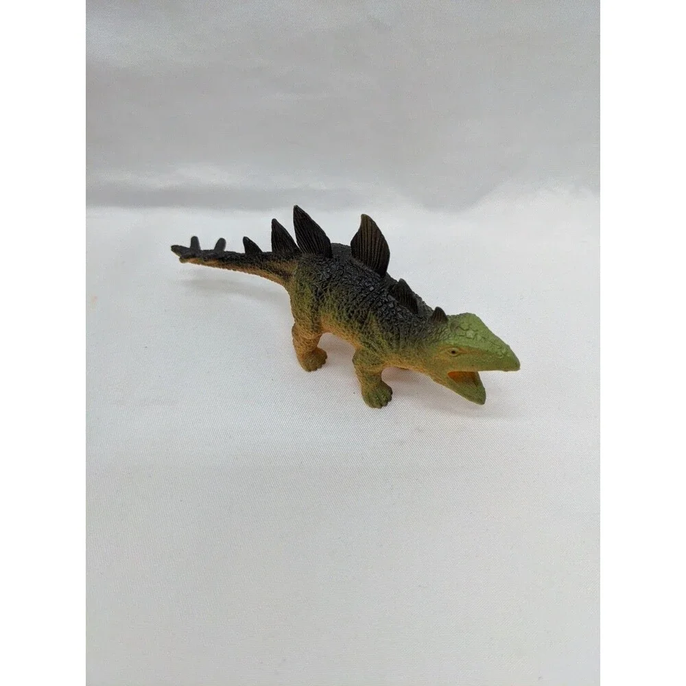 Lot Of (7) Dinosaur Toys Trex Stegasaurs Triceratops